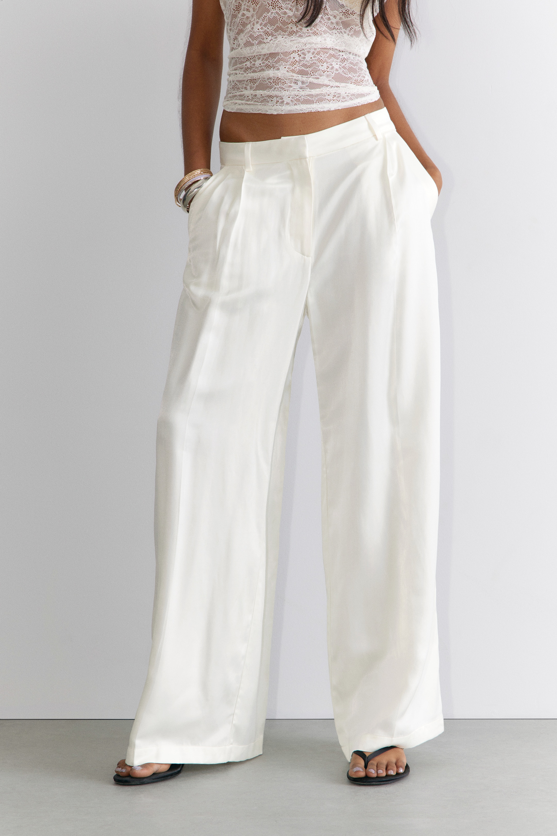 View larger image: Pleated High Waist Wide Leg Suiting Trousers - White Satin - Ladies | H&M GB 2