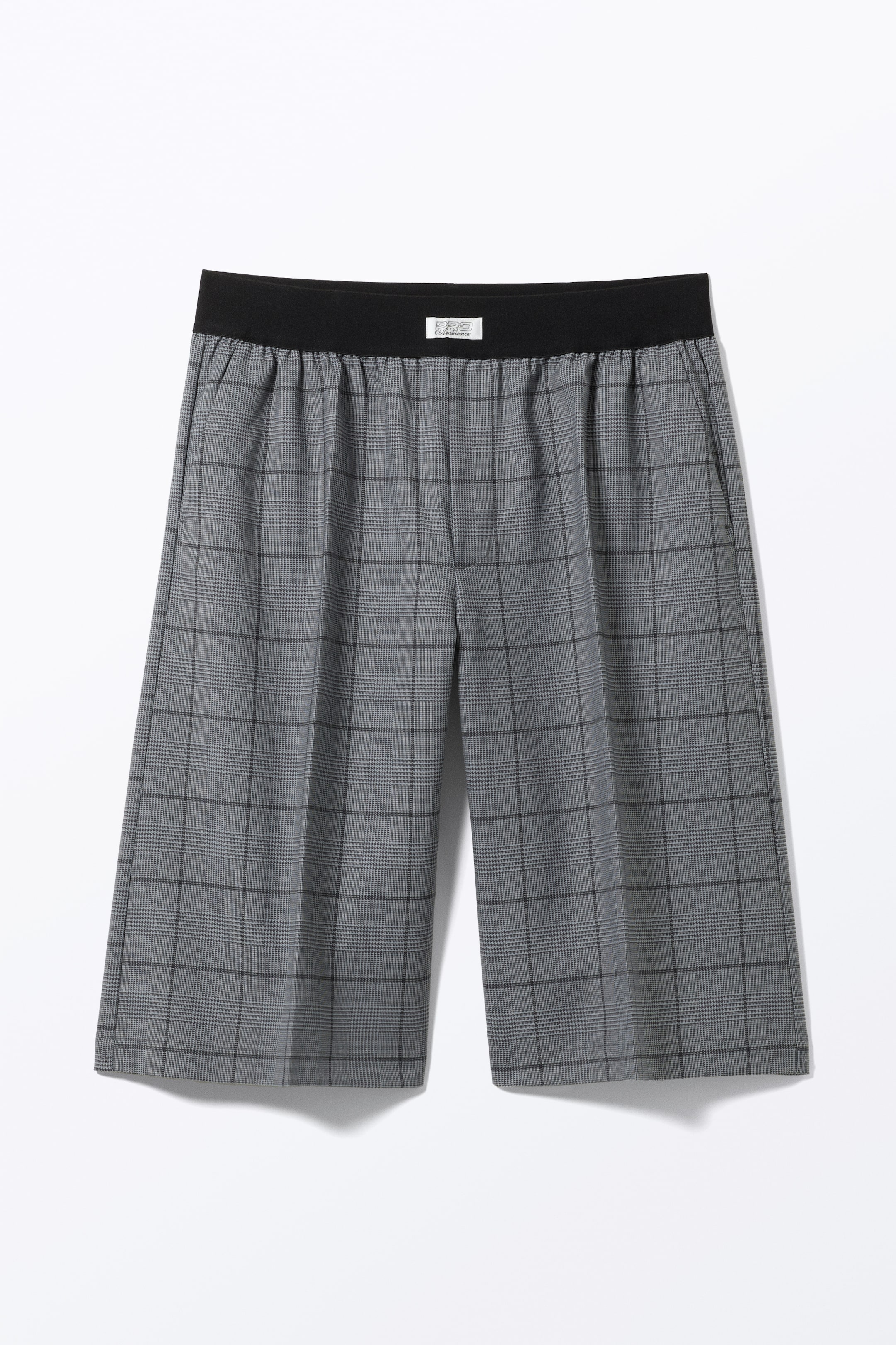 Visa större bild: Avslappnade pull-on-shorts med låg midja - Grå-rutig - DAM | H&M SE 8