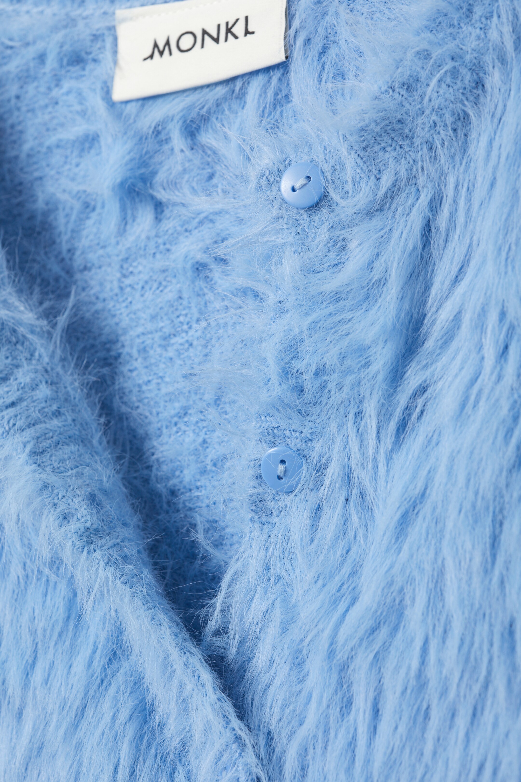 Visa större bild: Lurvig stickad kofta - Ljusblå - DAM | H&M SE 2