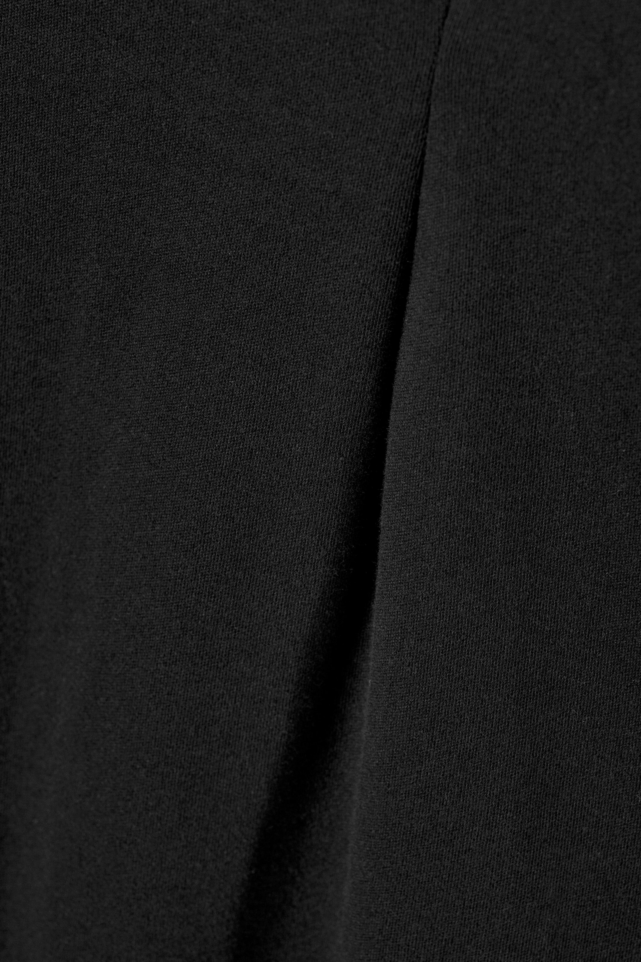 Größeres Bild anzeigen: Strukturiertes Mini-T-Shirt-Kleid - Schwarz - Ladies | H&M AT 5