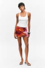 Orange/Rot - Calypso-Blüte - Mini-Skort zum Hineinschlüpfen - 0