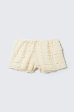 Weiß - Mini-Shorts aus Spitze mit Rüschen - 0