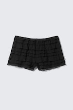 Schwarz - Mini-Shorts aus Spitze mit Rüschen - 0