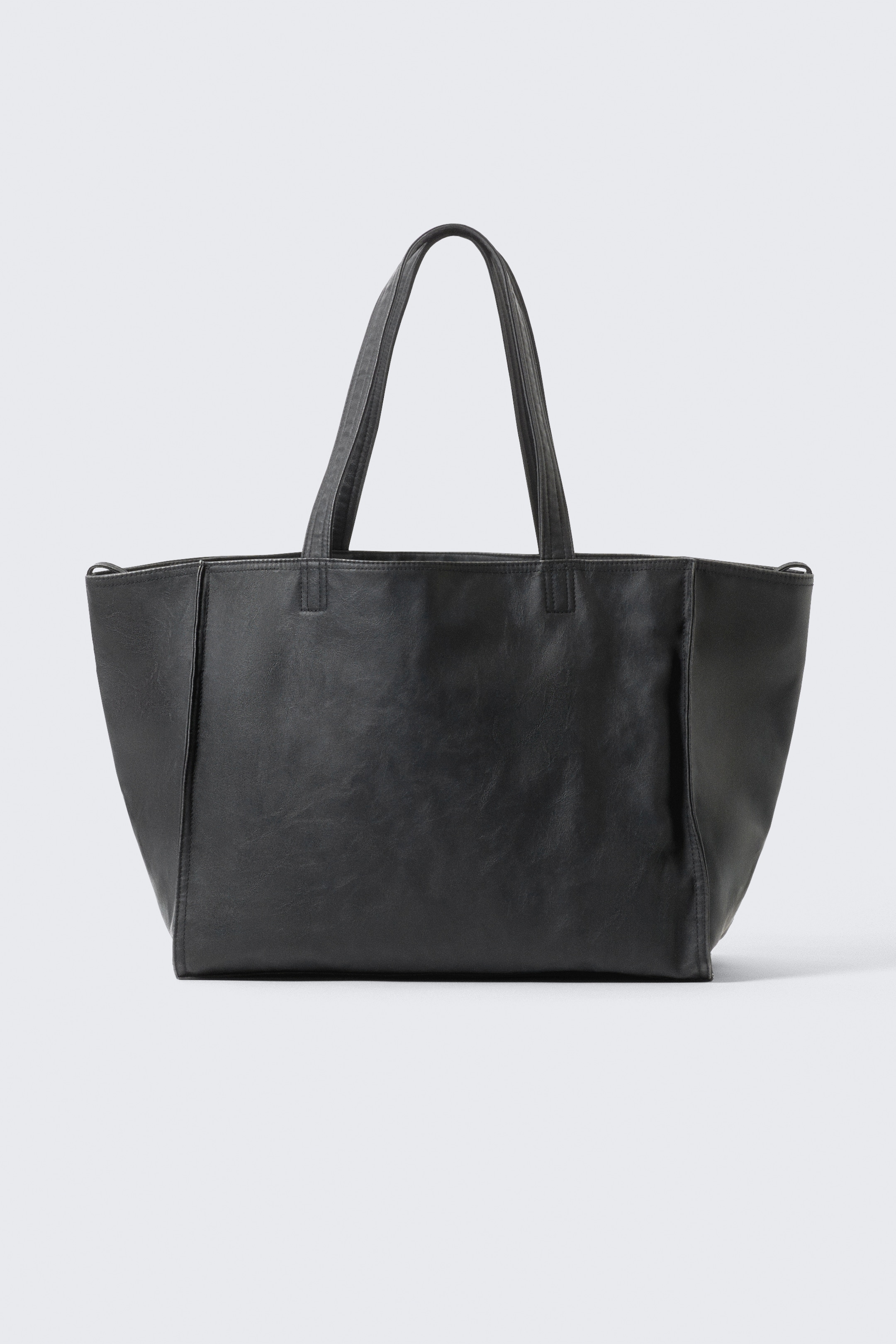 Visa större bild: Stor Tote-väska i Konstläder - Svart - DAM | H&M SE 1