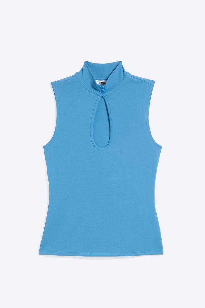 A sleeveless keyhole top in a vibrant blue colour is facing front, featuring a high mock neck with two small matching buttons and a large teardrop-shaped cut-out at the centre of the chest. The top shows a fitted silhouette with clean sleeveless armholes and a straight hemline. - 1