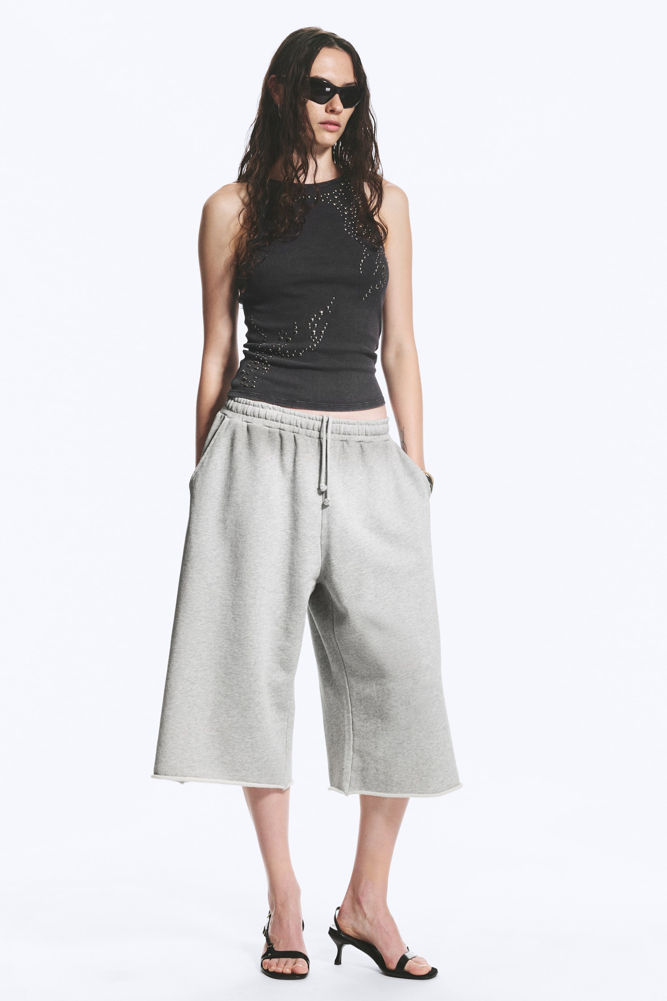 Ver imagen más grande: Shorts de rizo holgados - Gris claro empolvado jaspeado - MUJER | H&M ES 1