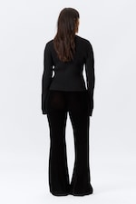 Zwart - Uitlopende fluwelen broek met lage taille - 3