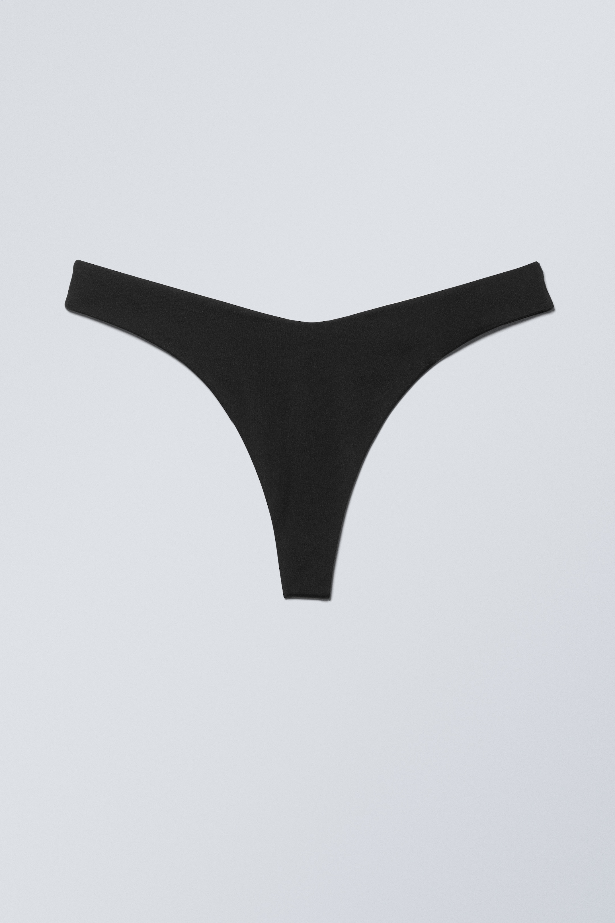 Visualizza immagine più grande: Slip bikini perizoma con silhouette a V - Nero - DONNA | H&M IT 1