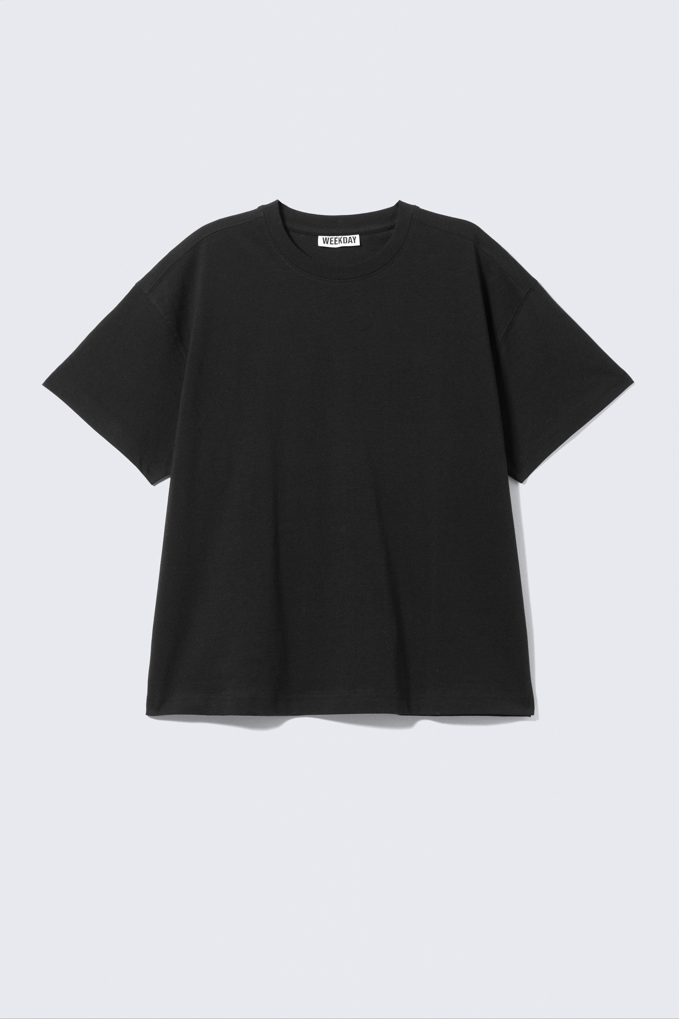 Visa större bild: Avslappnad boxig t-shirt i bomull - Svart - DAM | H&M SE 4