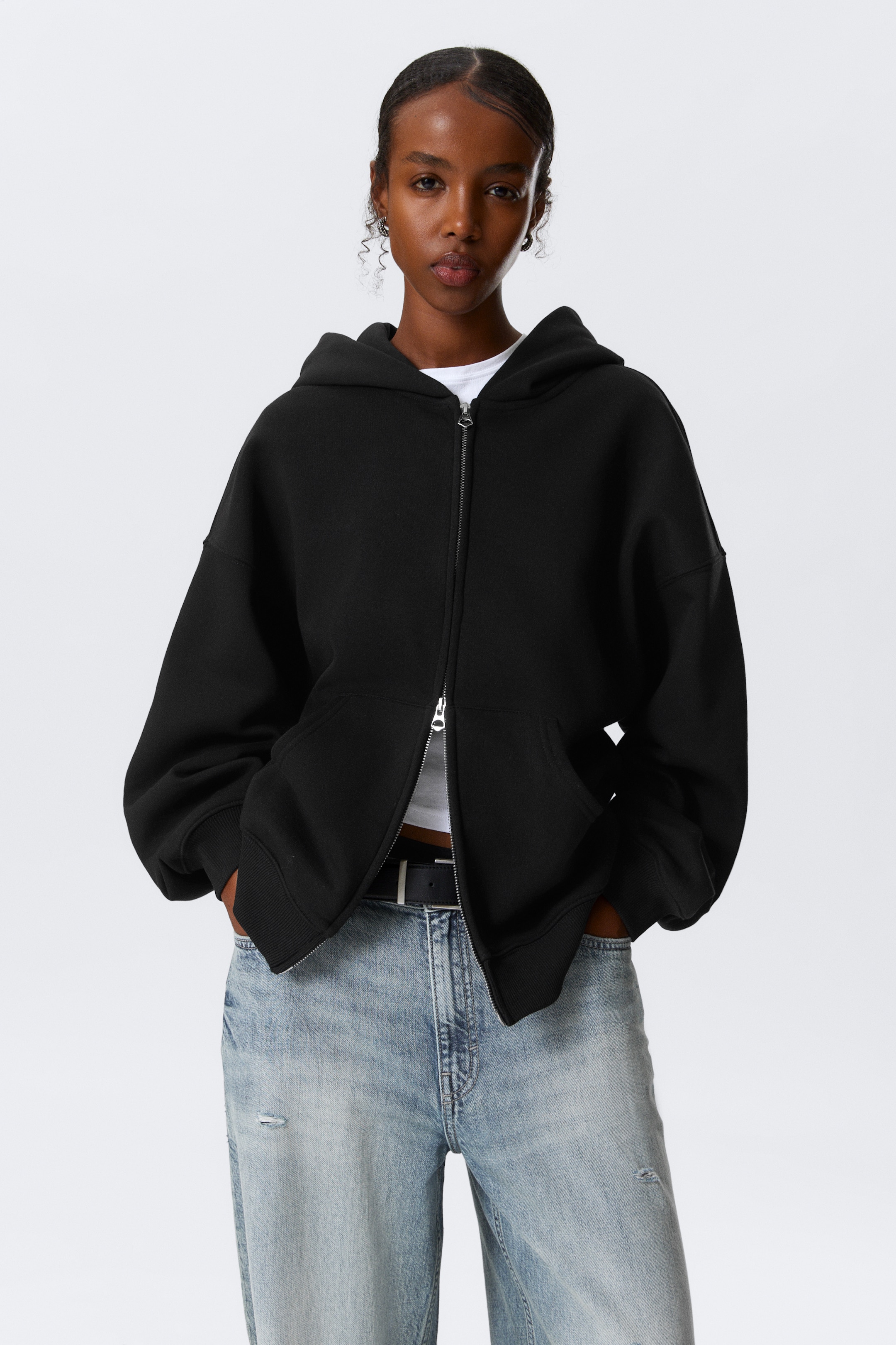 Visualizza immagine più grande: Felpa oversize pesante con cappuccio e cerniera - Nero - DONNA | H&M IT 1