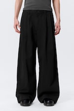 Black - Otis Loose Pleated Cotton Twill Chinos - 1