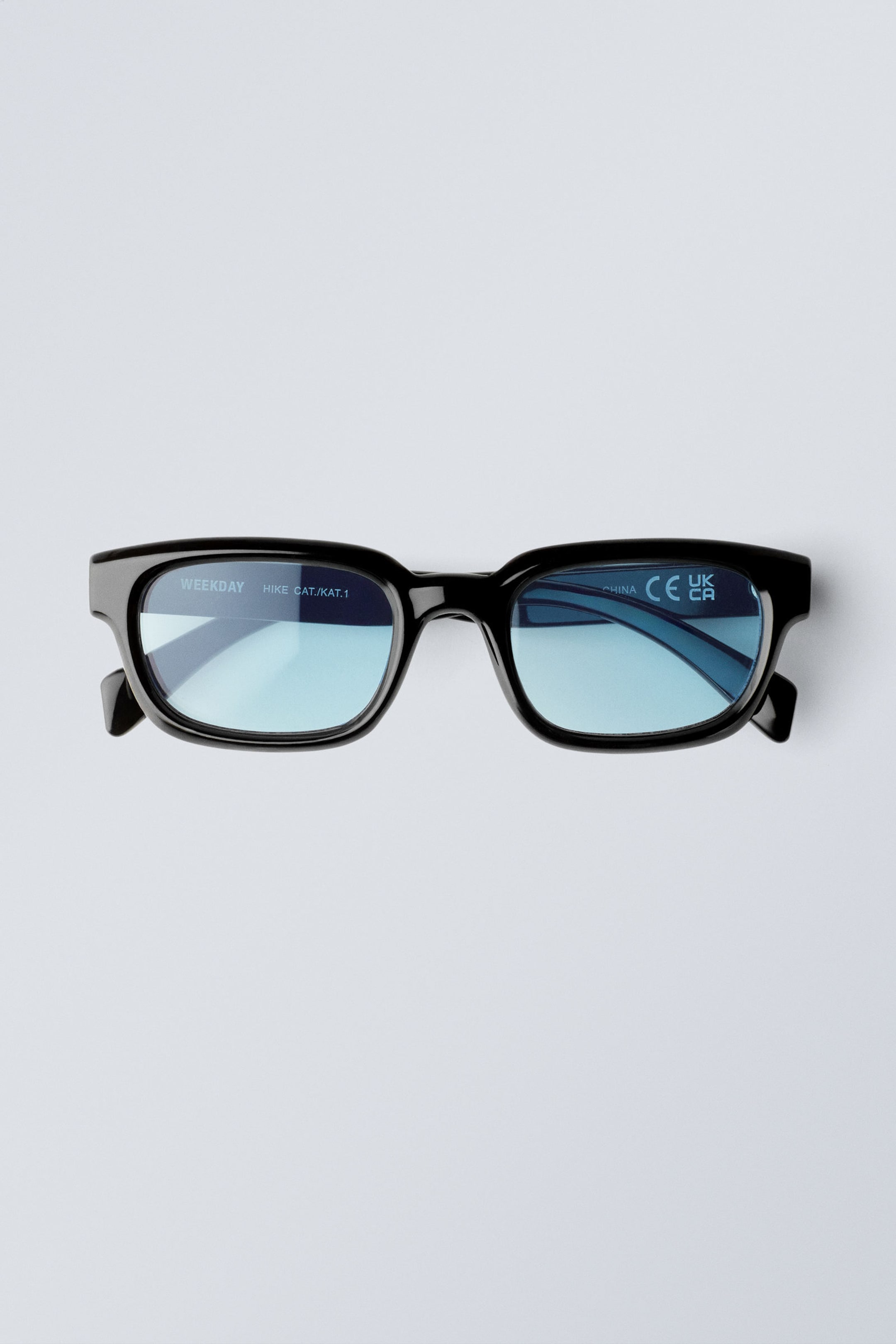 Schwarz - Blaue Gläser - Kühne Unisex-Sonnenbrille mit rechteckigem Rahmen - 1