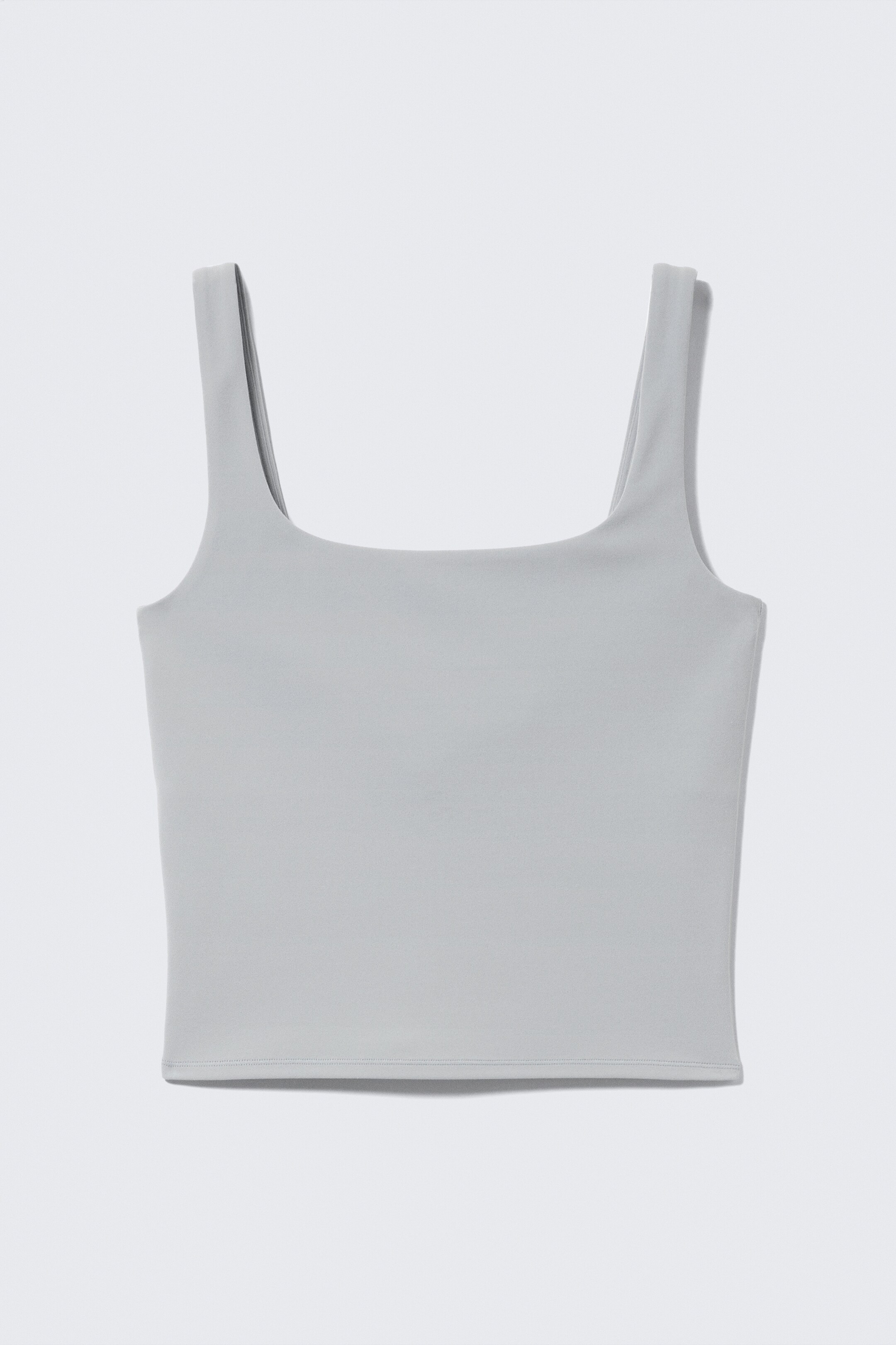 Zobrazit větší obrázek: Zkrácený sportovní top - Light Dusty Grey - ŽENY | H&M CZ 1