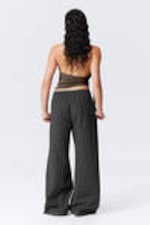 Zwart met strepen - Losvallende katoenen broek met lage taille - 3
