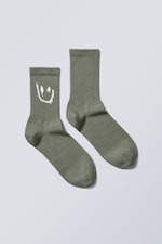 Khaki mit Lächeln - Jacquard-Sportsocken - 0