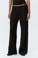 Zwart - Zachte bootcut broek met lage taille - 1