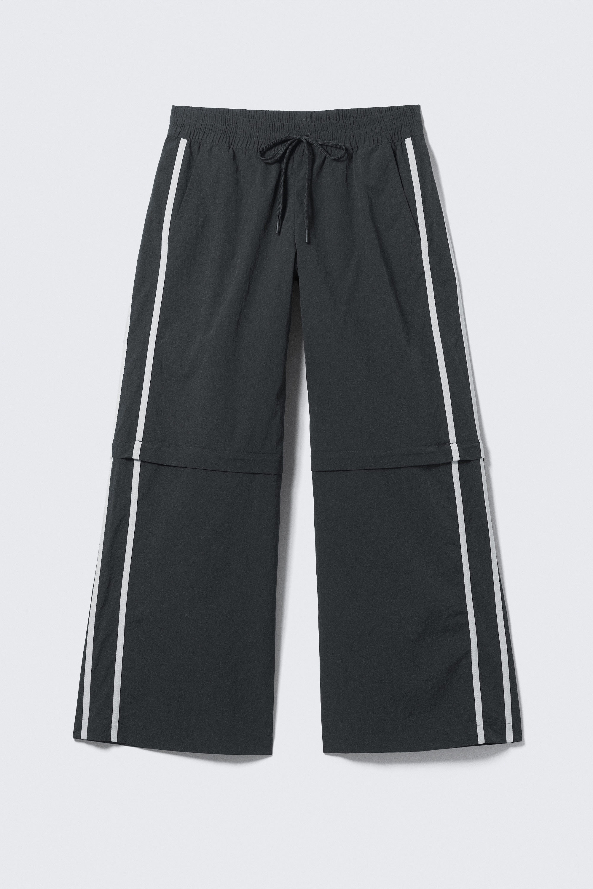 zip-off nylon track trousers - Black - Beige Stripe | Monki WW