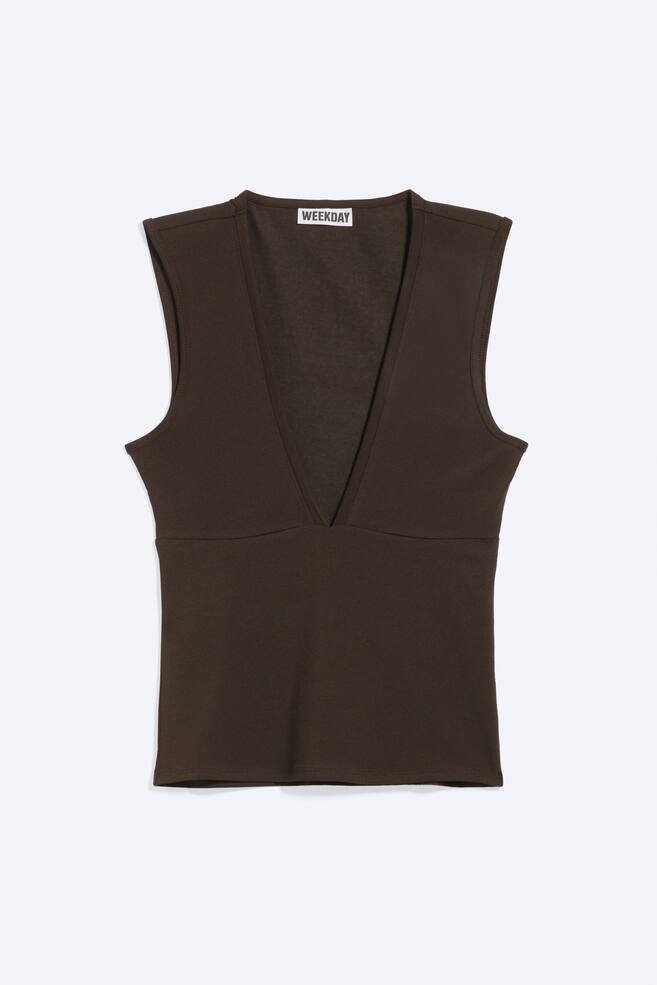 A dark brown fitted sleeveless top is shown from the front, featuring a plunging V-neckline and an under-bust seam. - 1