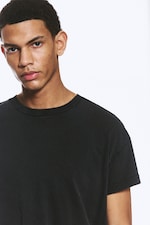 Sliten Svart - T-shirt i boxig modell med holkärm i bomull - 1