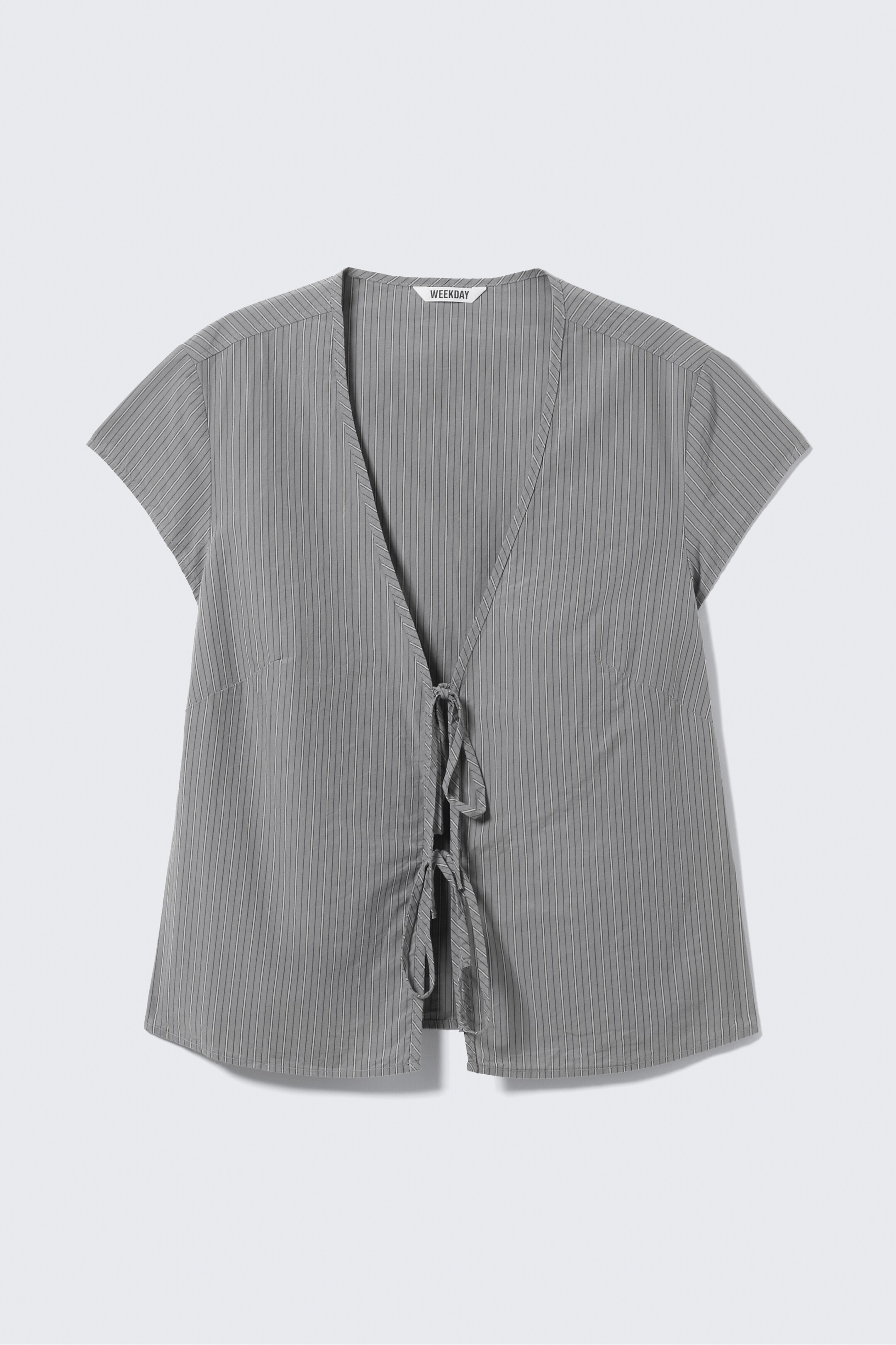 Ver imagen más grande: Blusa de algodón con escote en V y lazo delantero - Gris a rayas - MUJER | H&M ES 5
