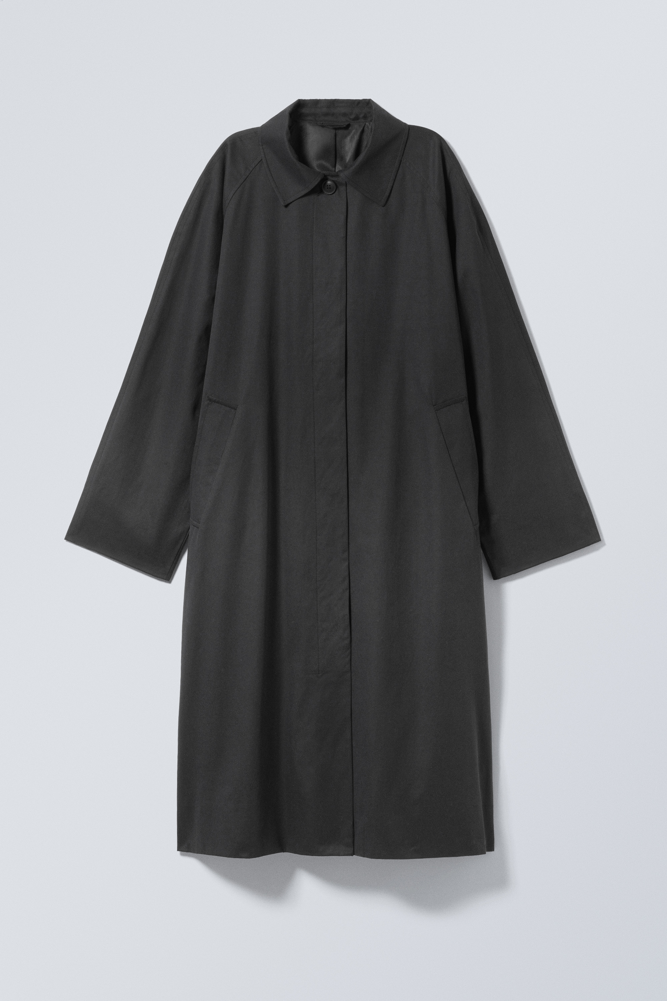 Visa större bild: Enkelknäppt oversized carcoat - Svart - DAM | H&M SE 1