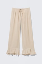 Helles Beige - Lockere Hose mit mittlerer Bundhöhe und Volants - 4