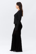 Zwart - Uitlopende fluwelen broek met lage taille - 2