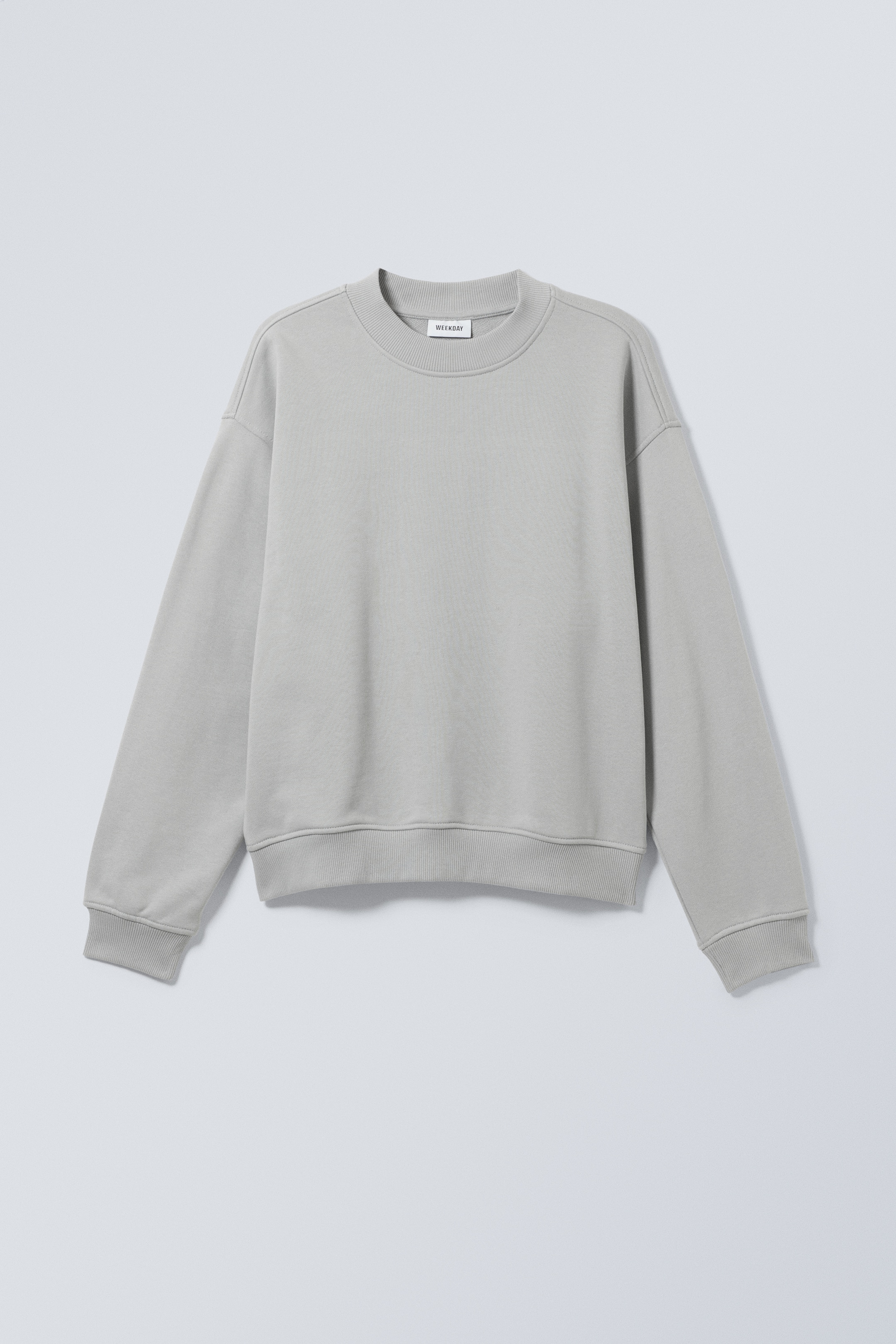 Vis større bilde: Tykk boxy collegegenser i frotté - Støvgrå - HERRE | H&M NO 1