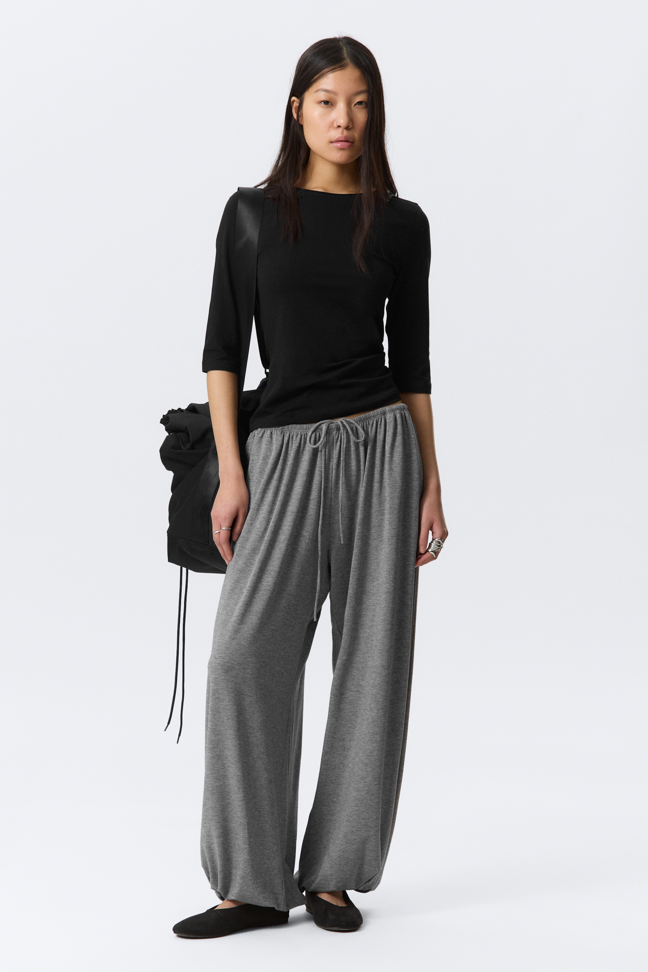 Ingrandisci l'immagine: Soft Mid-Rise Balloon Trousers - Grey Melange - DONNA | H&M CH 1