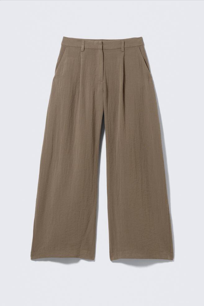Pantalón holgado de tiro bajo y efecto arrugado - Beige/Negro - 1