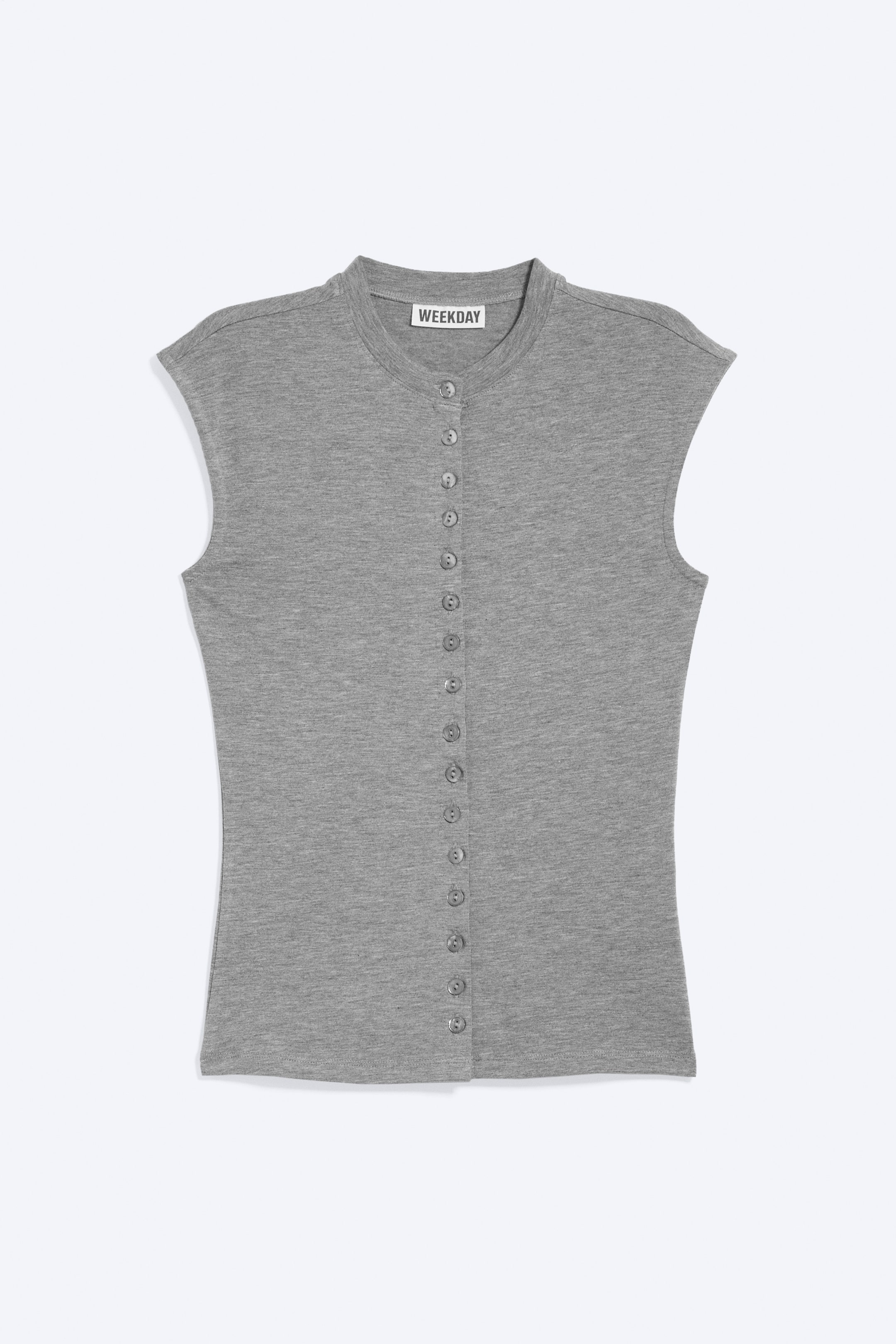 View larger image: A grey fitted knit top is shown front-facing, featuring a band collar, cap sleeves, and a complete front placket with small round grey buttons extending from the neckline to the hem. A "WEEKDAY" label is visible on the inner back neck.