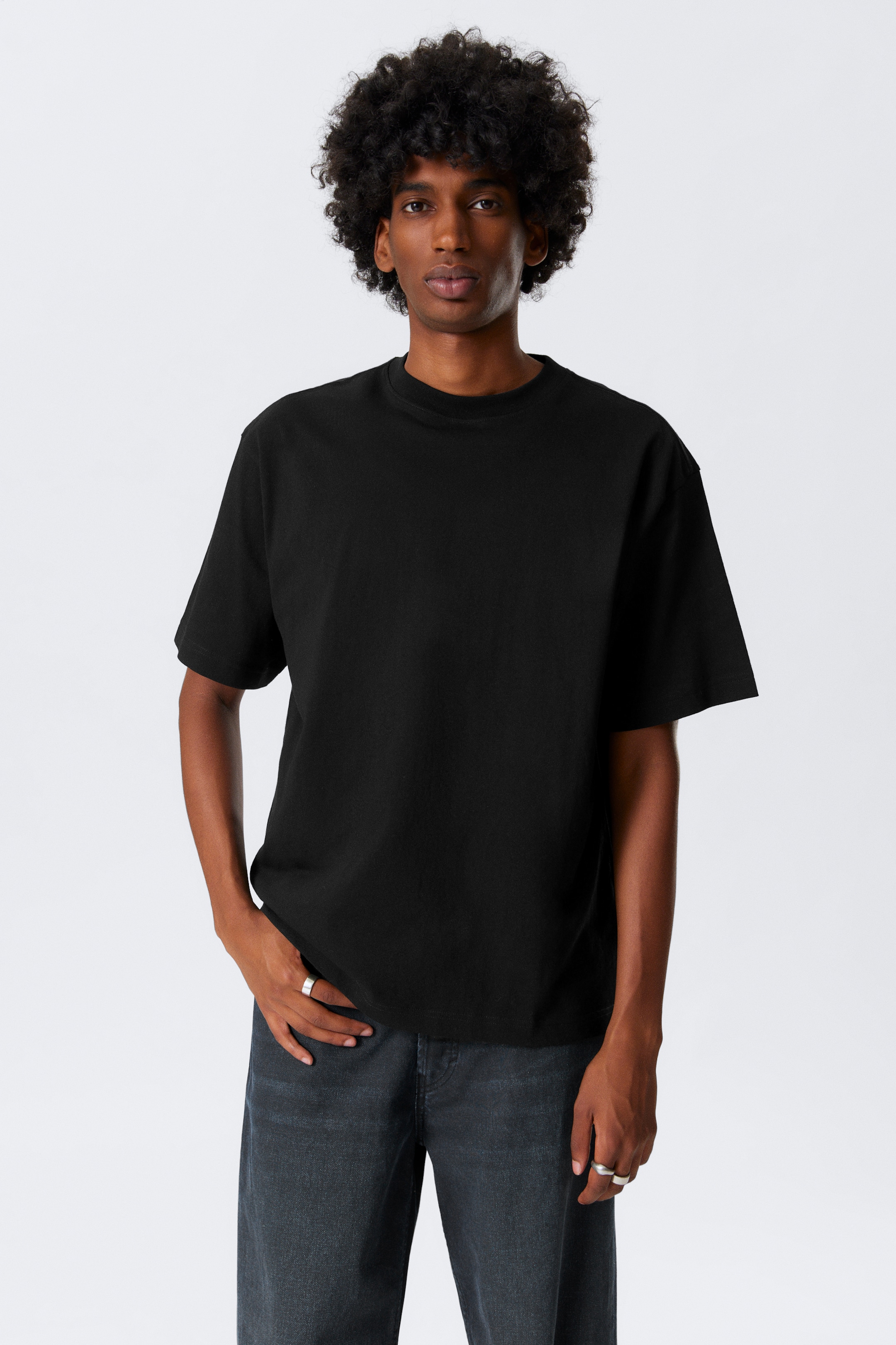 Größeres Bild anzeigen: Locker geschnittenes T-Shirt aus Baumwolle - Schwarz - Men | H&M AT 1