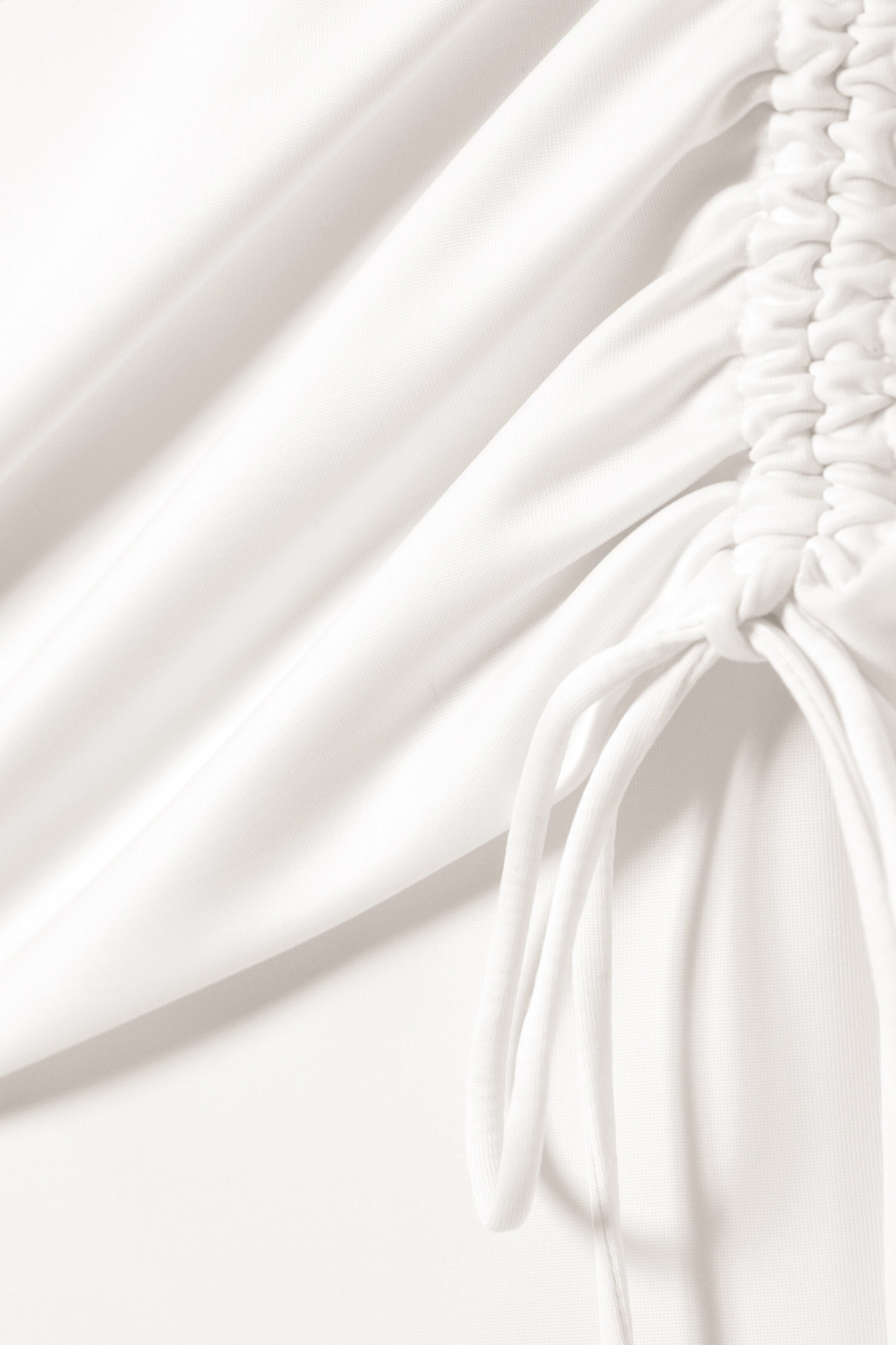 Größeres Bild anzeigen: Geraffte Capri-Leggings mit niedrigem Bund - Off-white - Ladies | H&M AT 6