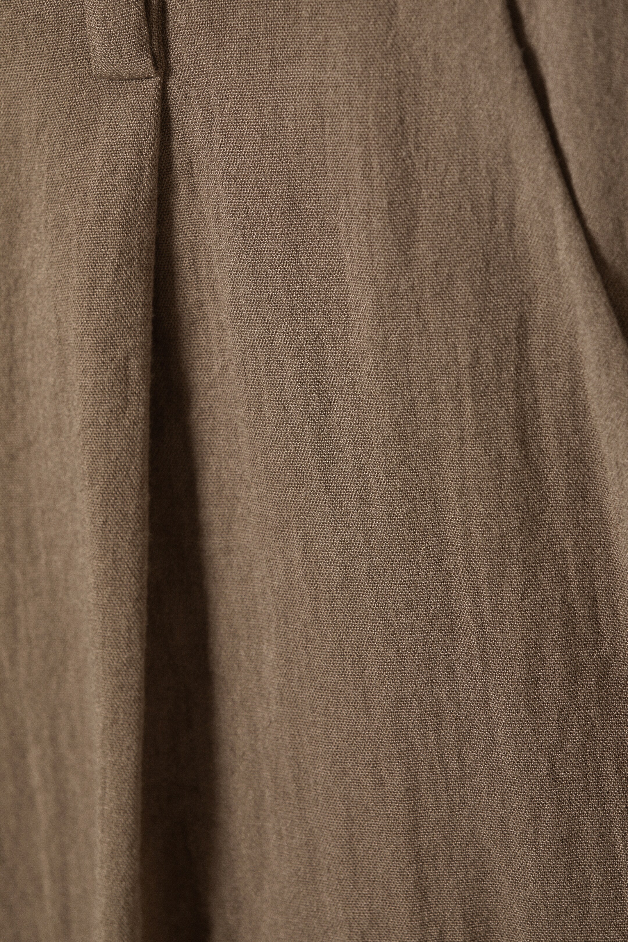 Visualizza immagine più grande: Pantaloni wide leg a vita bassa stropicciati - Beige - DONNA | H&M IT 5