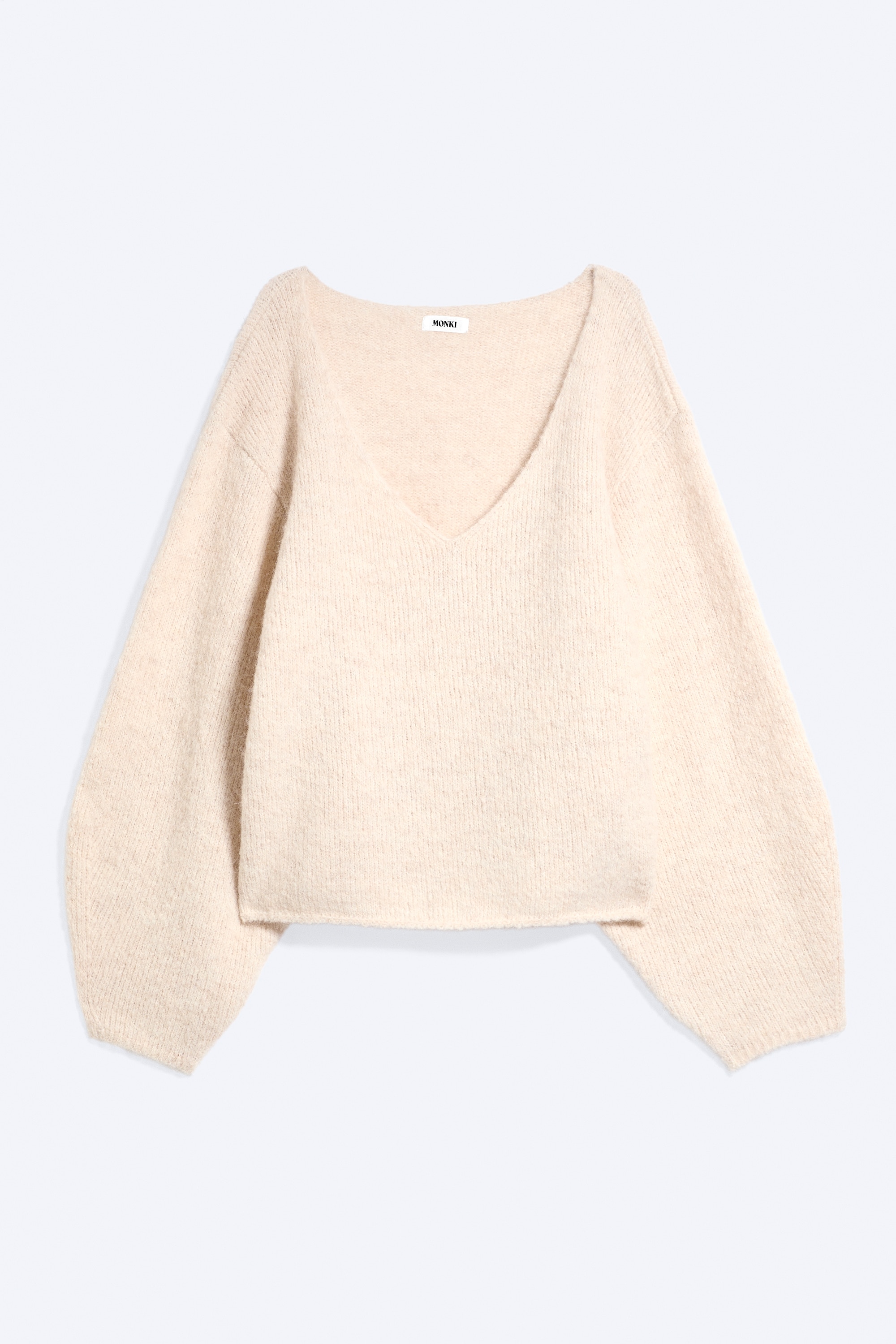 Oversize kötött V-nyakú pulóver