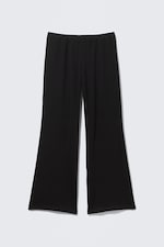 Zwart - Zachte bootcut broek met lage taille - 4