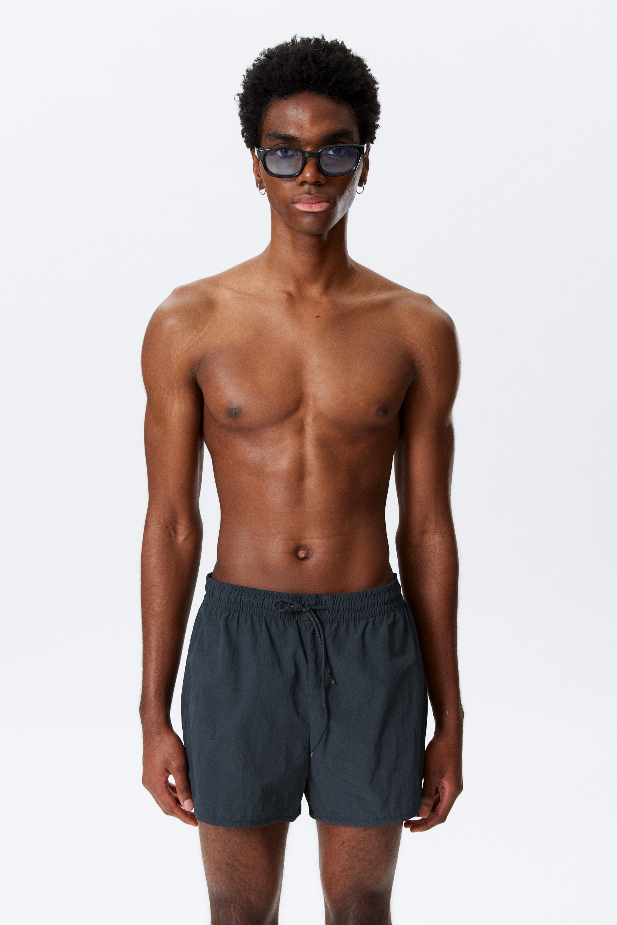 Ver imagem maior: Calções de banho estruturados até meio da coxa - Azul-escuro - HOMEM | H&M PT 1