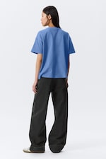 Blauw met wassing - Ruimvallend boxy T-shirt van katoen - 2