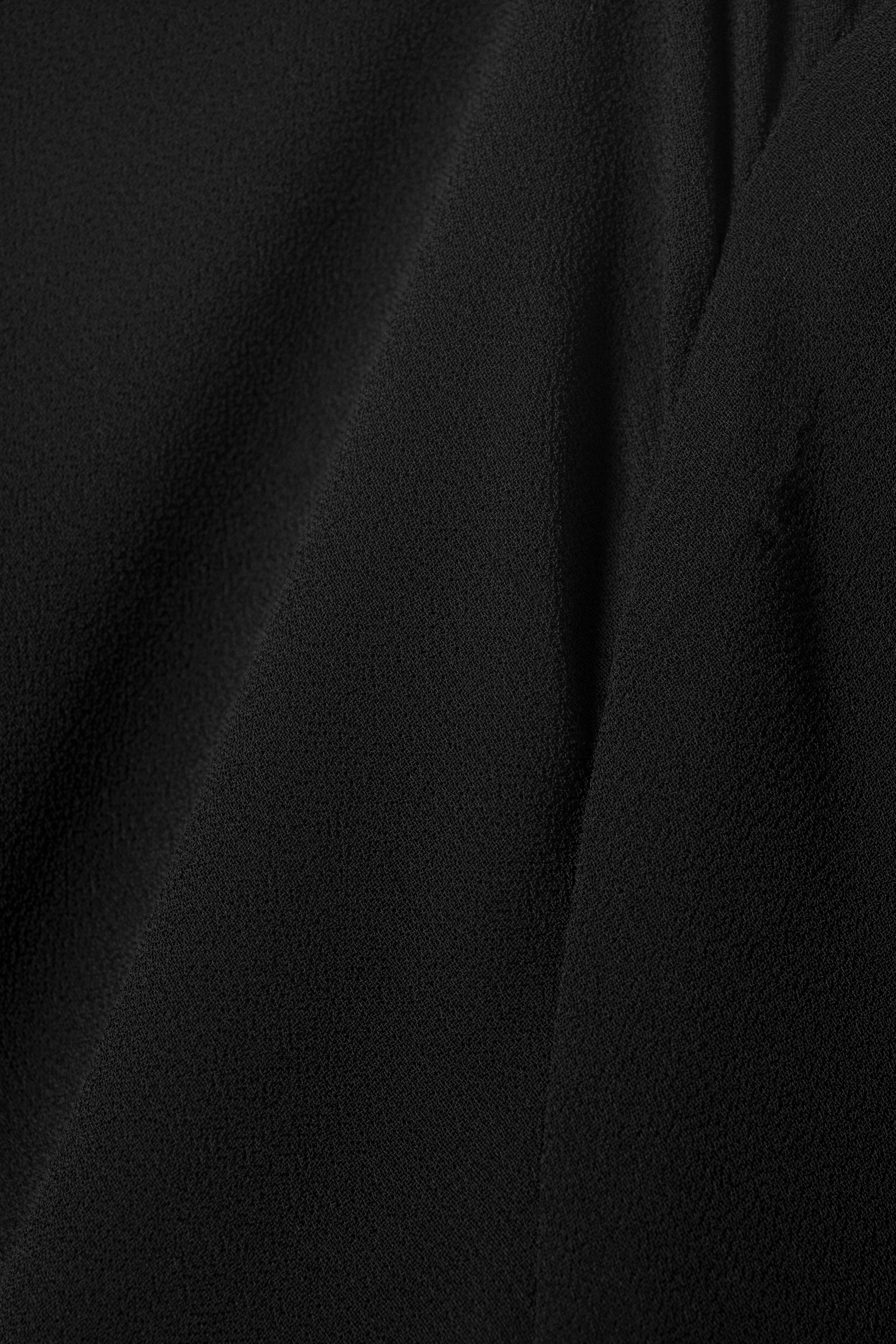 Näytä suurempi kuva: Läpikuultava epäsymmetrinen pitkähihainen paita - Musta - NAISET | H&M FI 6