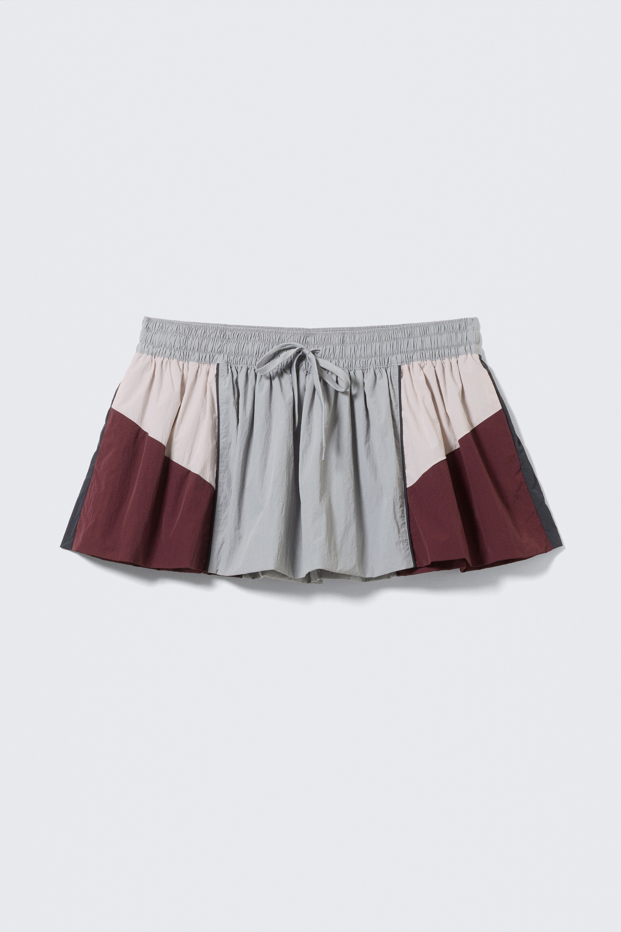 Visa större bild: A-linjeskuren minikjol i nylon med blockmönster - Grå/Rosa/Röd - DAM | H&M SE 4