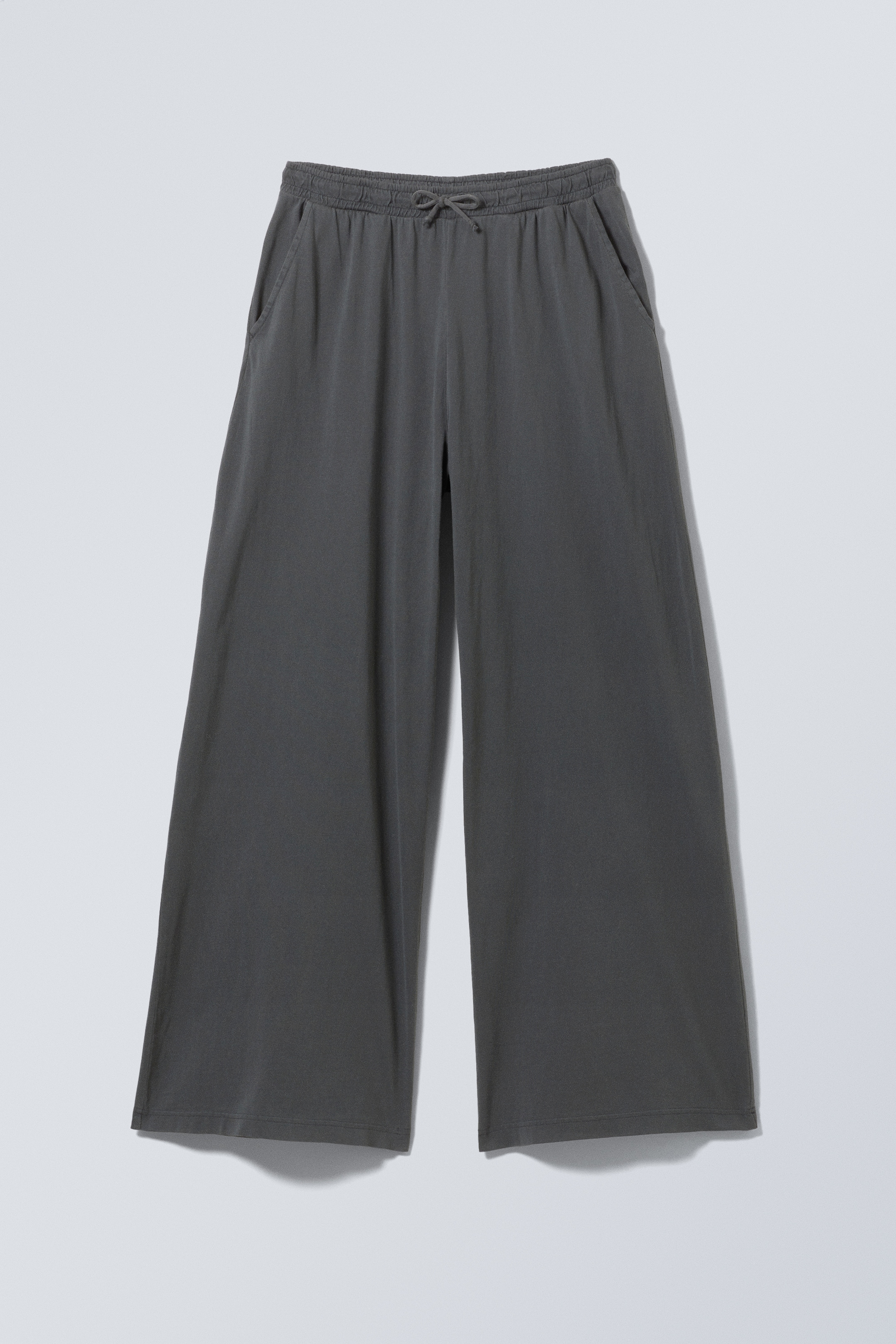 Zobacz większy obraz: Dżersejowe spodnie Loose Fit Wide Leg - Sprany Ciemnoszary - ONA | H&M PL 1