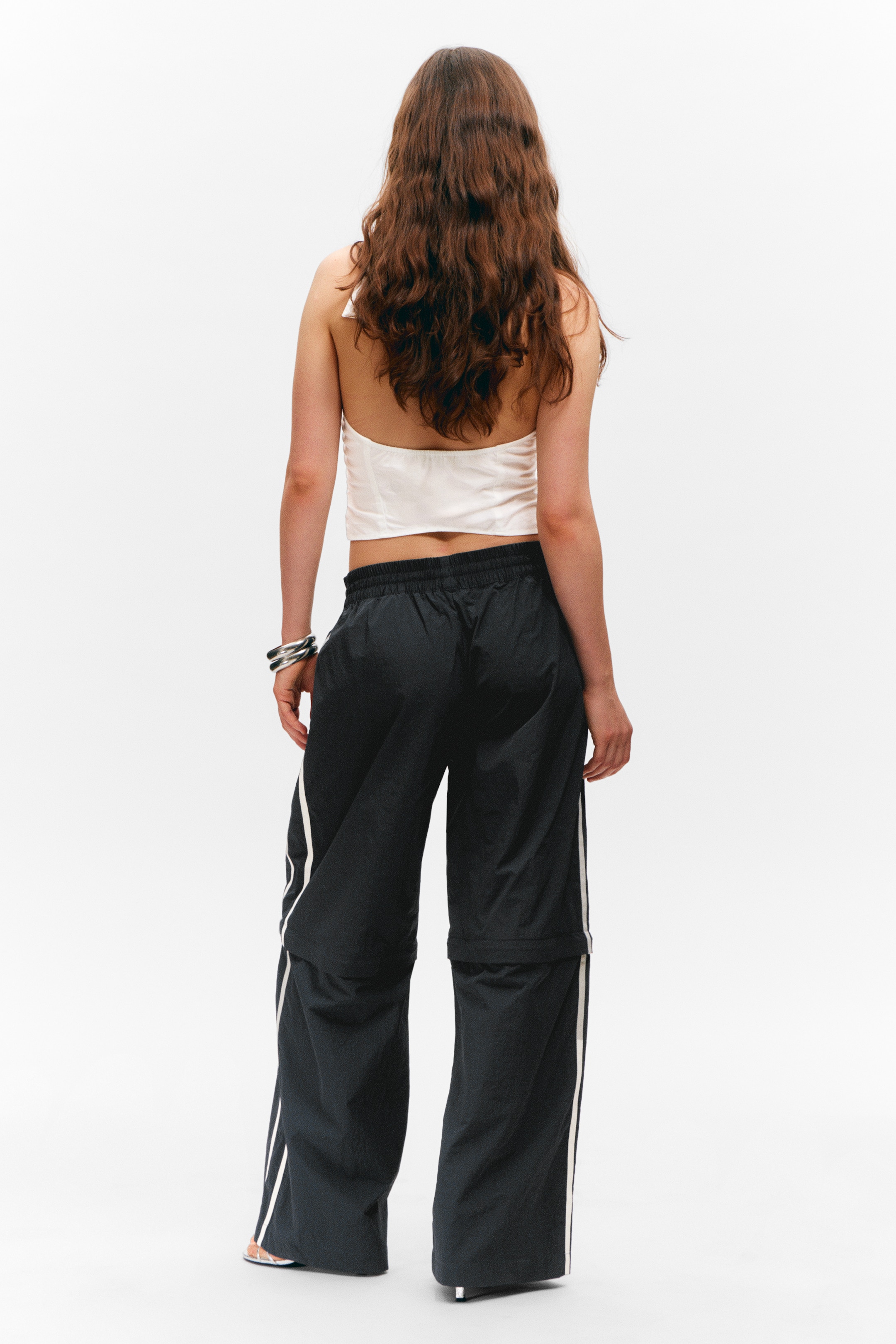 Vezi imaginea mai mare: Pantaloni de trening din nailon cu fermoar detașabil - Negru - Bej Dungat - FEMEI | H&M RO 4