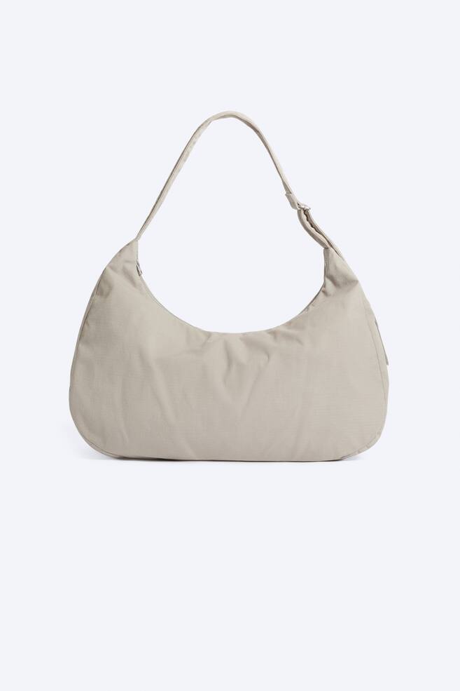 Half‑circle crossbody bag - Light Dusty Mole/Black/Khaki Green - 1