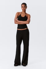 Zwart - Zachte bootcut broek met lage taille - 0