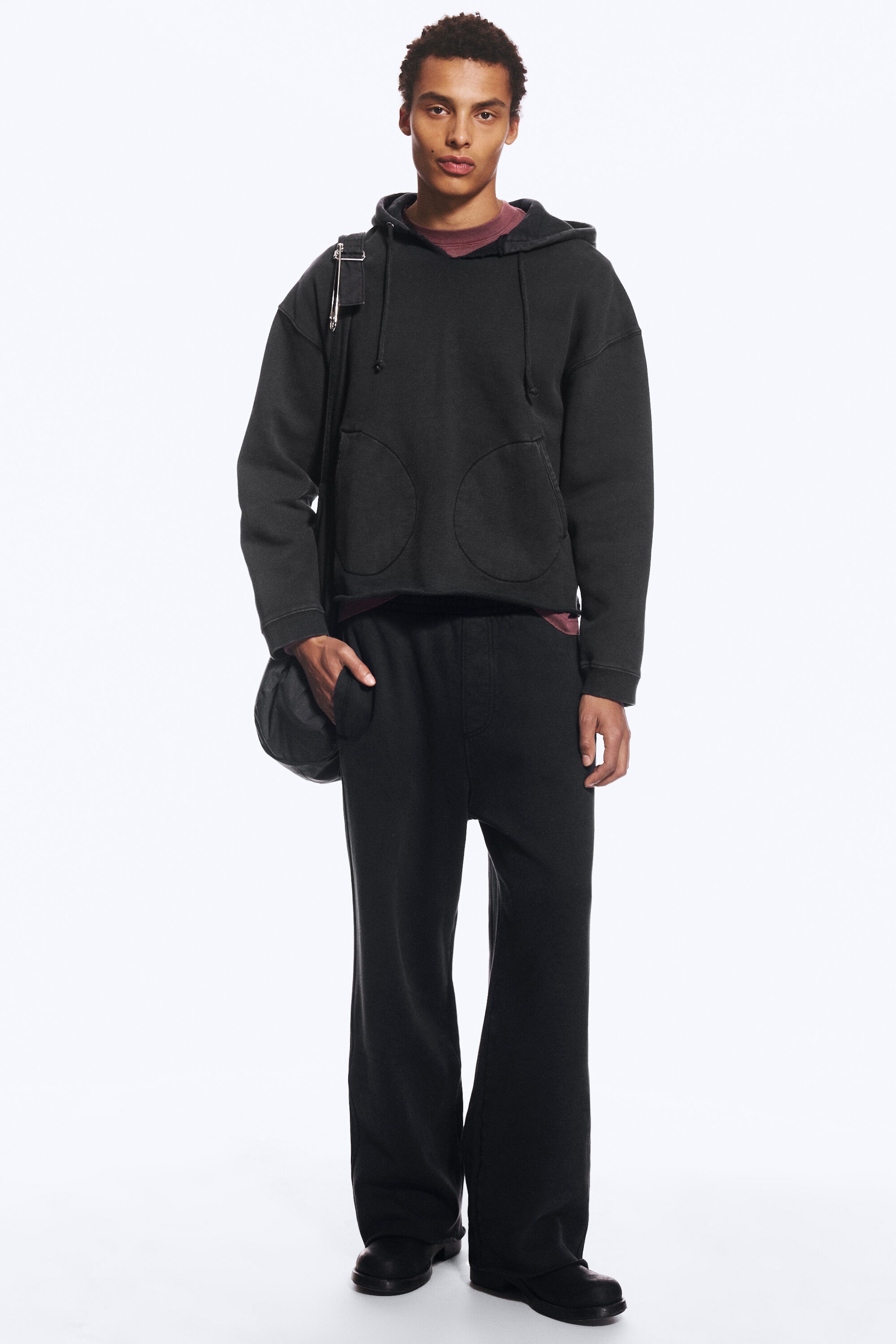 Schwarz - Weite Sweatpants mit mittlerem Bund und Waschung