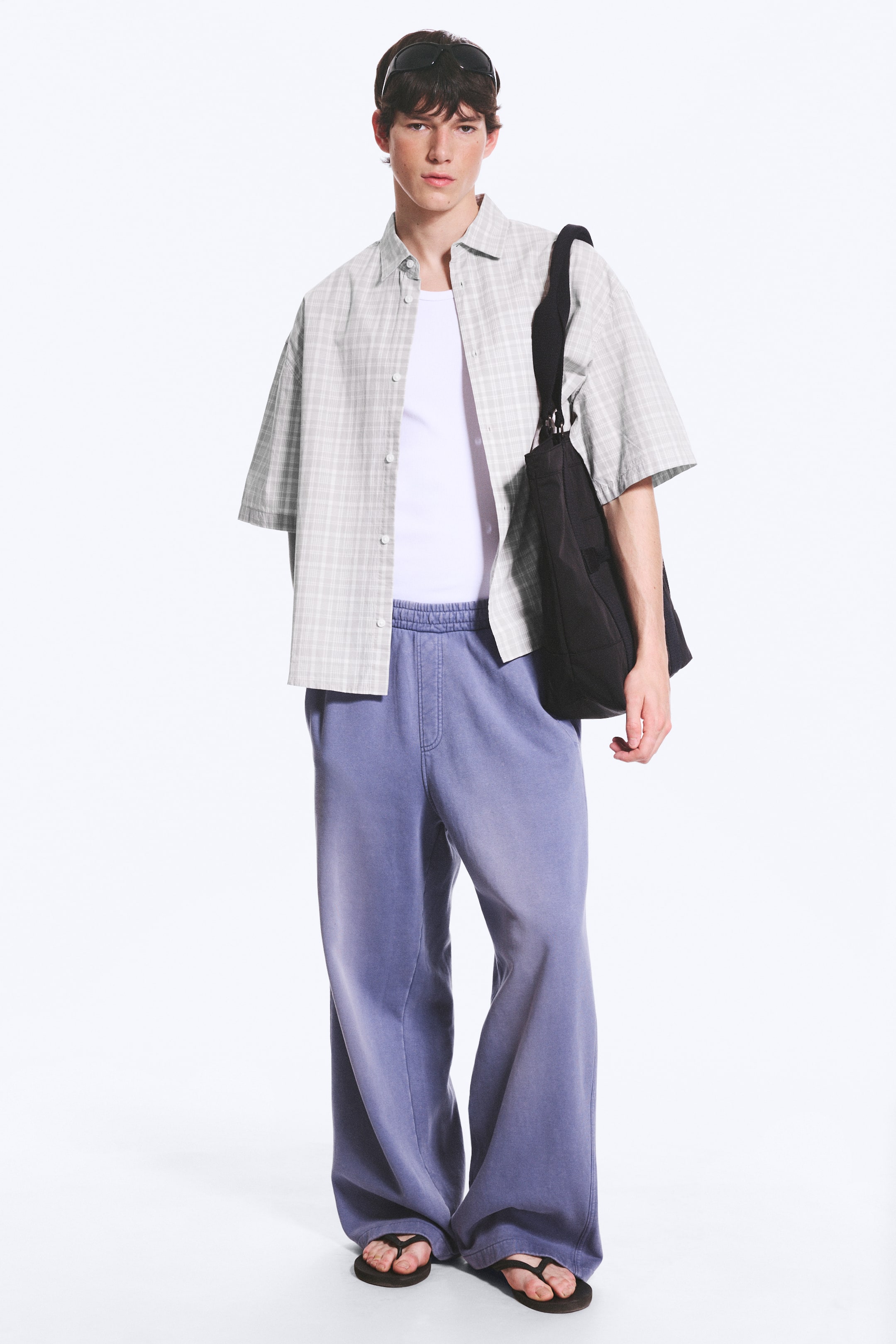 Visualizza immagine più grande: Pantaloni da tuta loose a vita media con straight leg - Blu lavato - UOMO | H&M IT 1