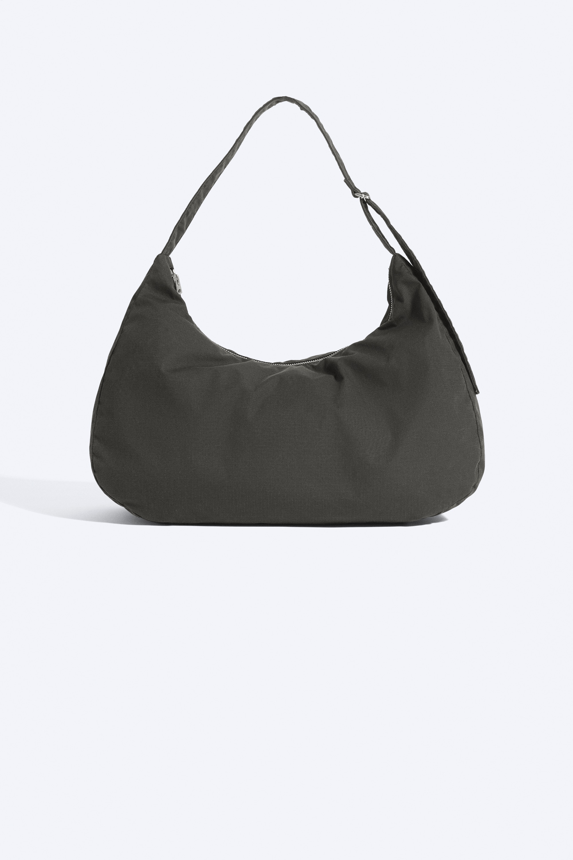 Półkolista torebka crossbody - Czarny/Zieleń khaki