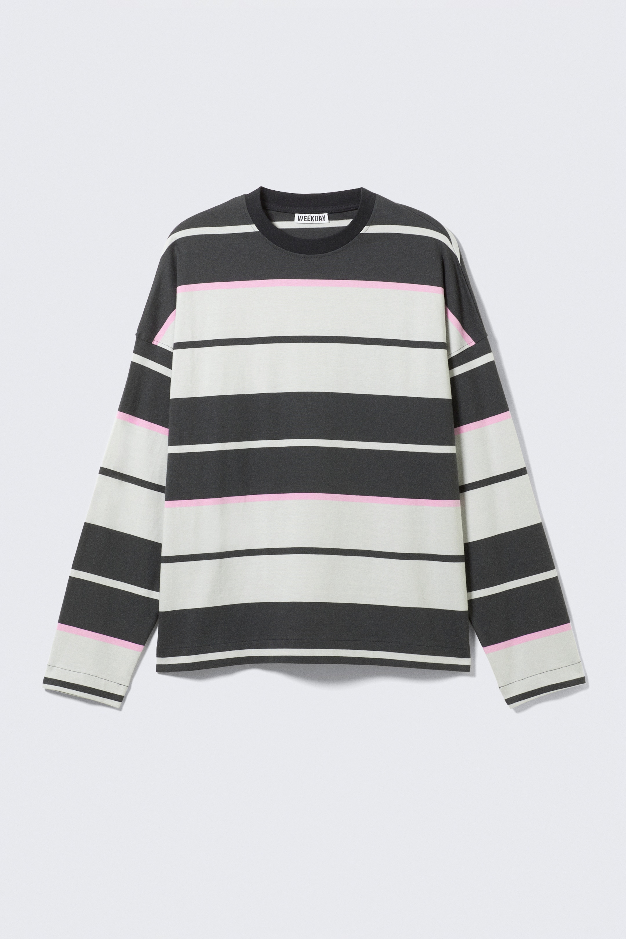 View larger image: A long-sleeved t-shirt is presenting a striped pattern, lying flat and front-facing. It is featuring wide horizontal stripes in dark gray and light gray, with a thin pink stripe running horizontally through the center of each light gray section. The shirt is designed with a ribbed crew neck.