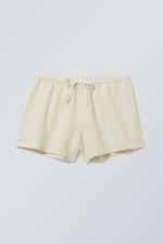 Beiges Blumen-Jacquardmuster - Strukturierte Shorts Tia - 0