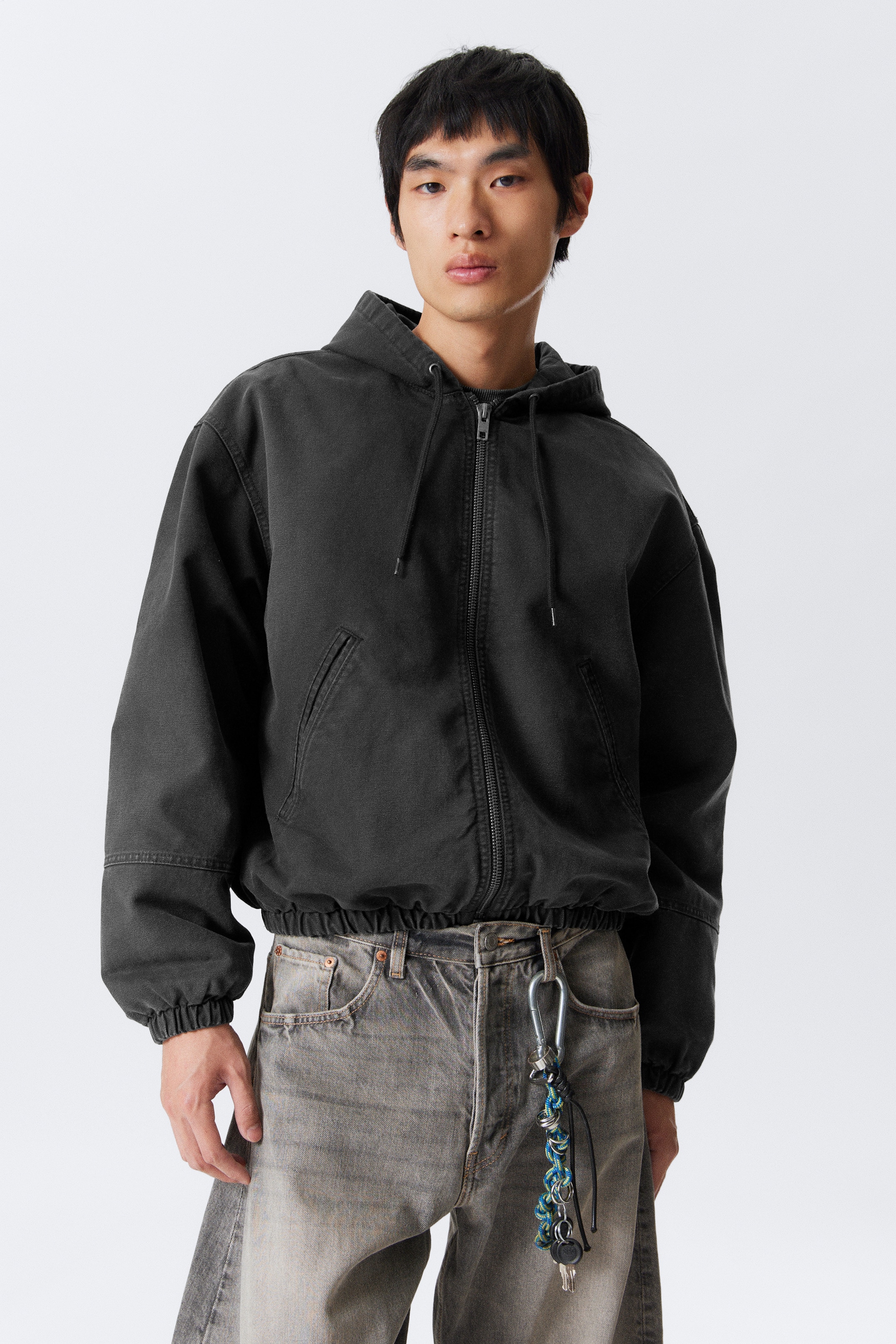 Grösseres Bild ansehen: Lässige Bomberjacke mit Kapuze - Verwaschenes Schwarz - HERREN | H&M CH 1